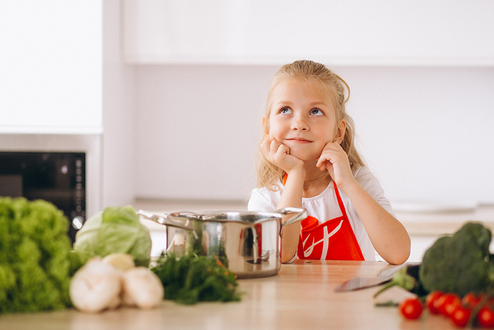 Criança na cozinha: estímulo para uma alimentação mais saudável